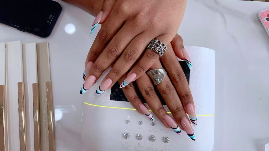 French manicure with blue dot nail art